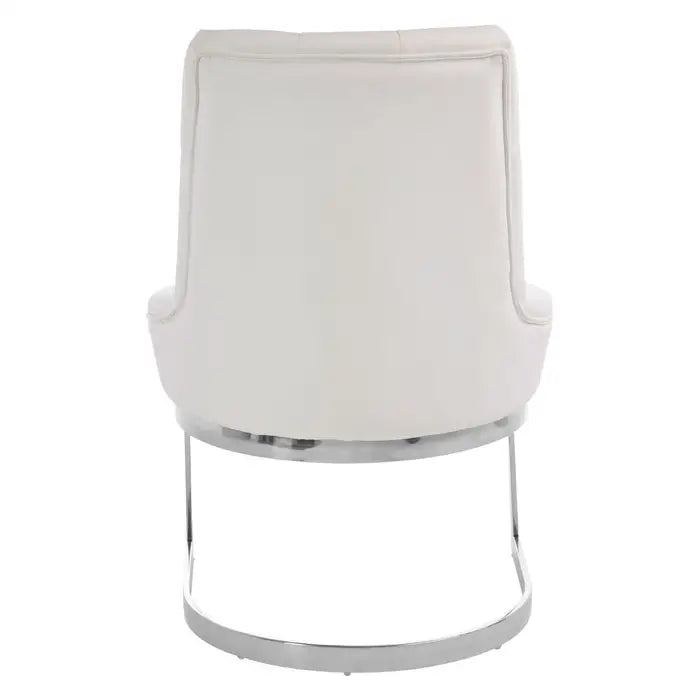 Allure dining chair upholstered with soft faux leather and has a fresh white finish. The stainless steel legs have a reflective silver finish and arc at the base to complement the chair's design lines. Rear view of chair with plain white background.