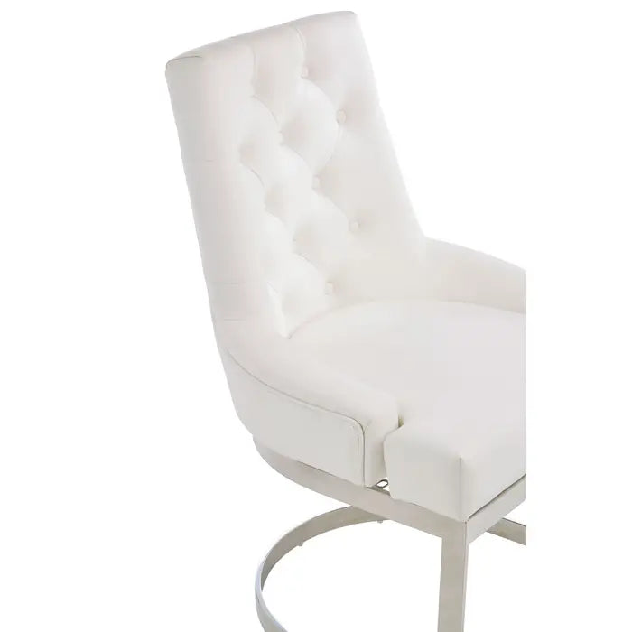 Close up Allure dining chair upholstered with soft faux leather and has a fresh white finish. Back button tufting detail on backrest. The stainless steel legs have a reflective silver finish and arc at the base to complement the chair's design lines. Plain white background.