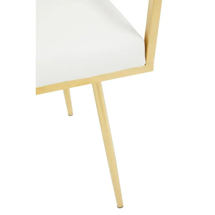 close up of gold finish stainless steel square frame with plain white background.