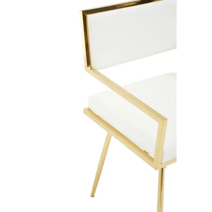 close up of gold finish stainless steel square frame with plain white background.