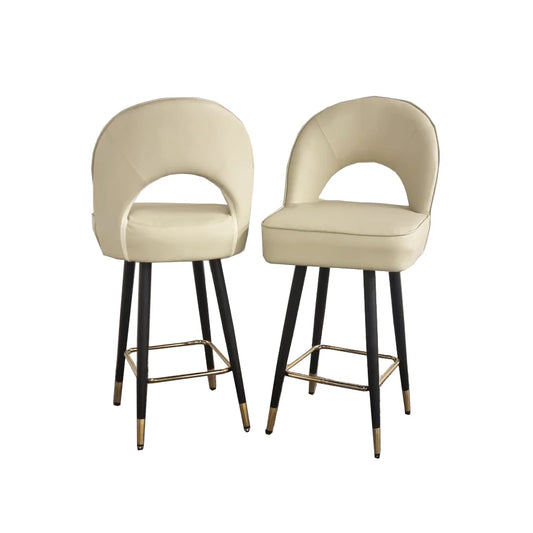Our Andes Leather Bar Stool Chairs are a stunning addition to any kitchen or dining area, featuring a curved open back in a beige PU leather fabric or Plush Velvet. The Astra also comes with Scandinavian style black legs that are capped with a subtle gold tip to give just that extra touch of luxury.  Dimensions: height 110cm, seat height 75cm seat width 50cm