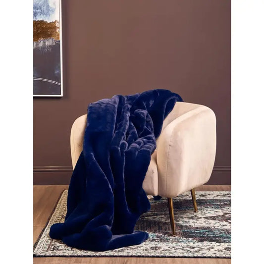 Soft touch fur throw in navy blue.
