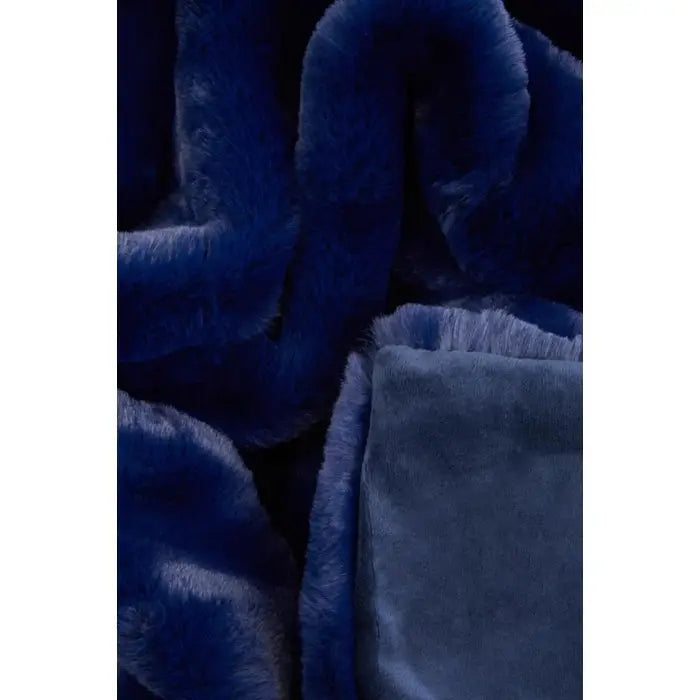 Soft touch fur throw in navy blue.