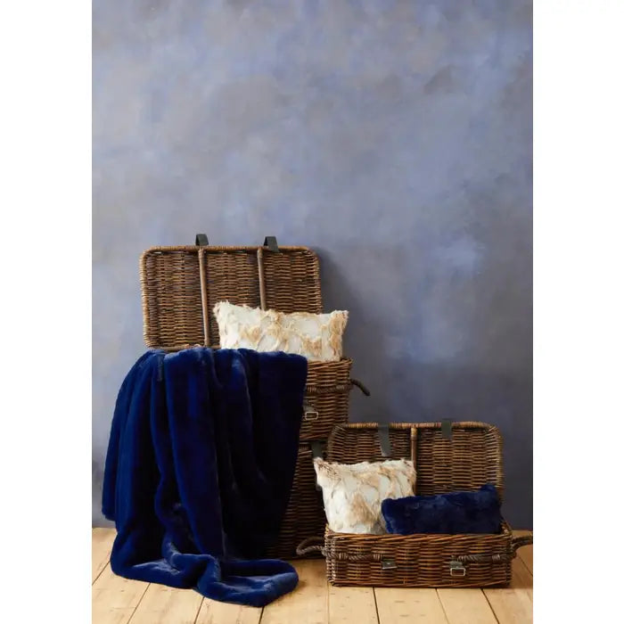 Soft touch fur throw in navy blue.