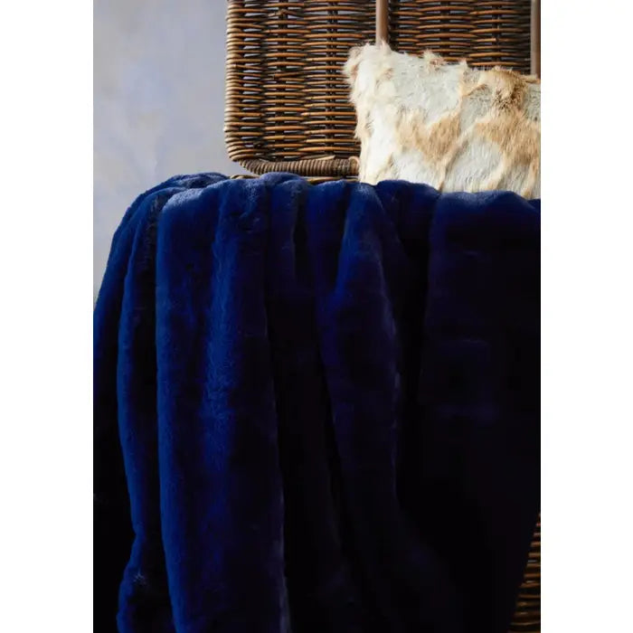Soft touch fur throw in navy blue.