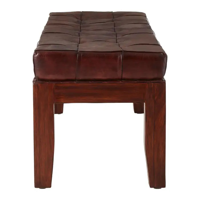 Antique brown leather, this bench has a soft button tufted seat.