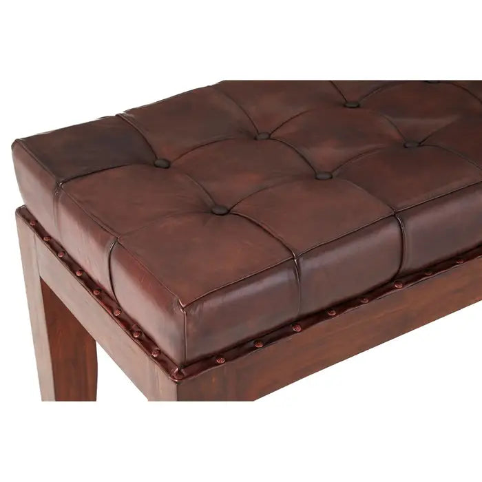 Antique brown leather, this bench has a soft button tufted seat.