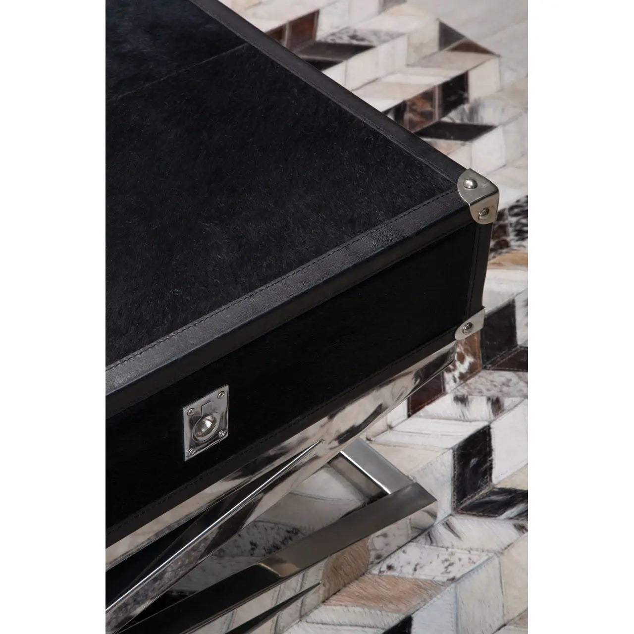 Black and silver with leather trim coffee table.