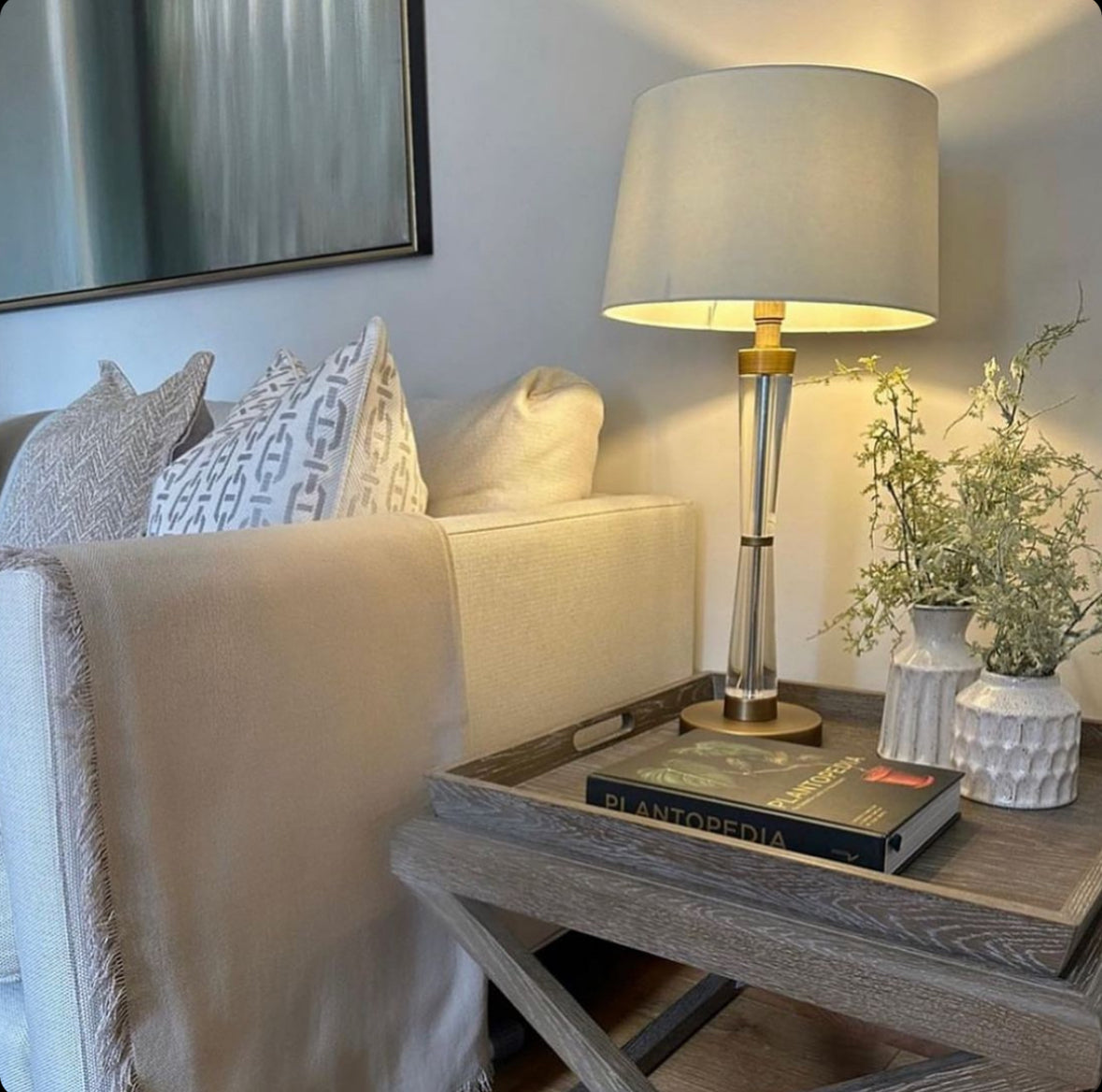 Designed with a unique crystal hourglass silhouette coupled with splashes of antique brass, the Nova Lamp exudes contemporary luxury.