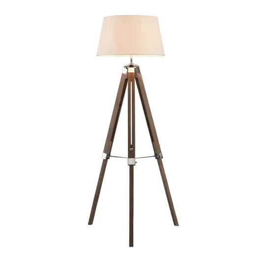 Plan background showing a tall floor lamp with dark wood tripod legs, cream shade and silver metal hinges.