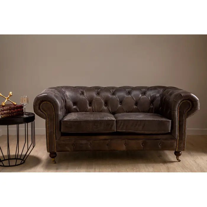 Chesterfield style 2 seater, grey leather sofa with studded detail.