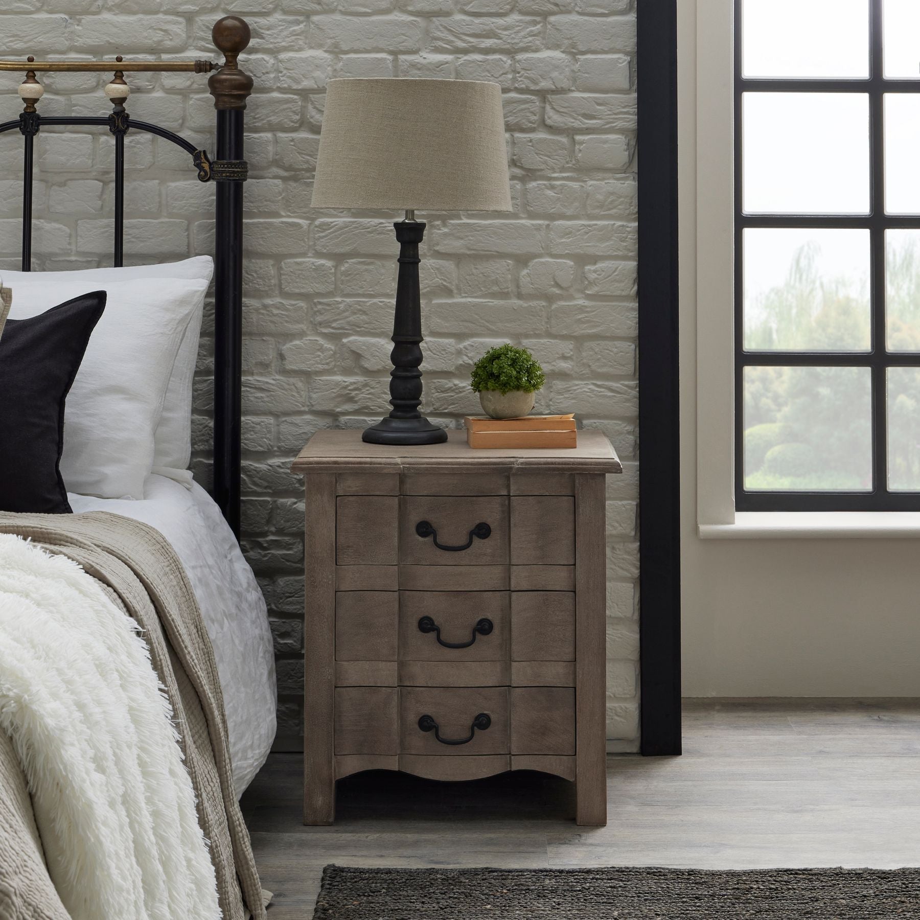 Classic hints of French style combined with contemporary touches. This stylish 3 drawer bedside table is both useful storage space within an elegant, handcrafted hard wood exterior