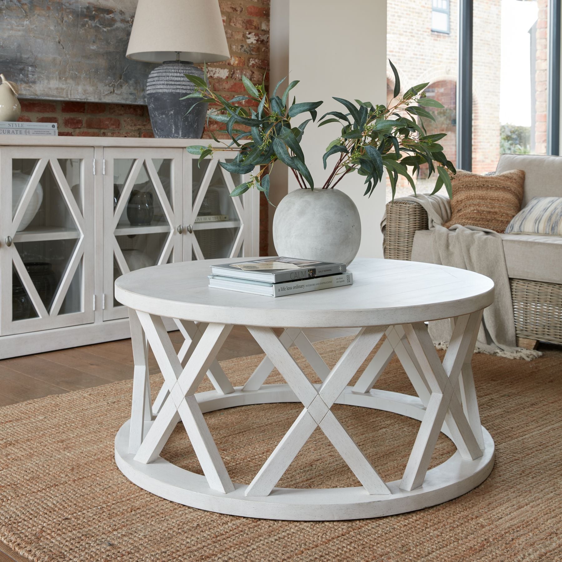 Circular white coffee table.