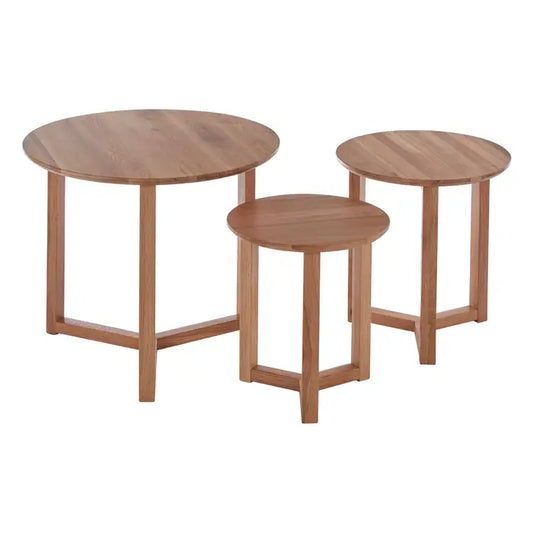 Simple and understated, this set of three oak side tables has a rustic appeal and can be styled with natural wood furniture and accessories.

Each of these side tables has a round top that features a prominent straight grain. They stand on trio of straight wooden legs that are connected to each other at the bottom. Simple and understated, this set of side tables has rustic appeal and can be styled with natural wood furniture and accessories.

Dimensions; H42 x L50 x W50
