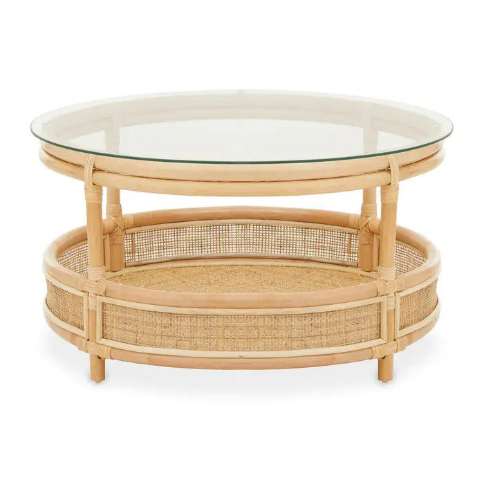 The natural texture of this coffee table with organic simplicity will effortlessly suit a natural living decor.

Maho round rattan coffee table with glass top is elegantly handcrafted from sustainably sourced rattan. Featuring a round profile, a clear glass piece rests on the top complemented with a matching lower shelf in decorative square webbing.

Dimensions: H40 x L75 x W75