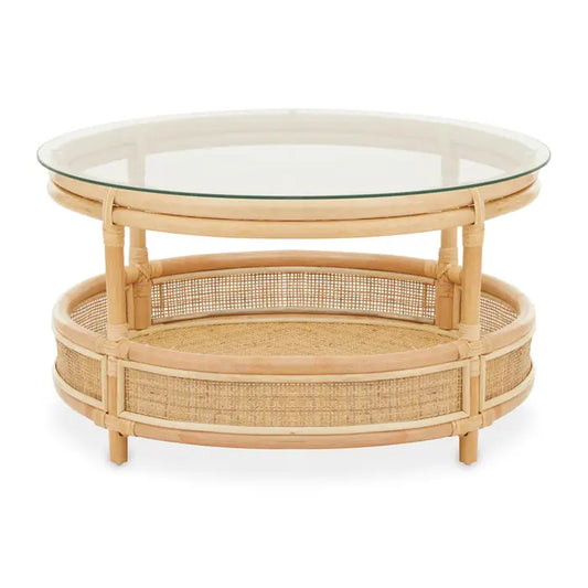 The natural texture of this coffee table with organic simplicity will effortlessly suit a natural living decor.

Maho round rattan coffee table with glass top is elegantly handcrafted from sustainably sourced rattan. Featuring a round profile, a clear glass piece rests on the top complemented with a matching lower shelf in decorative square webbing.

Dimensions: H40 x L75 x W75