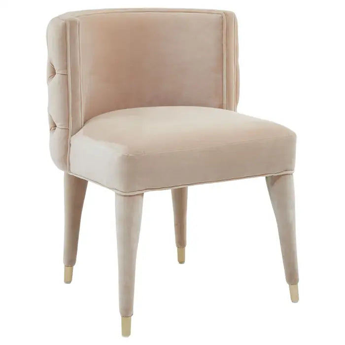An elegant feature chair with a deep button tufted backrest and tactile upholstery.

The Vici chair brings Boutique sophistication to the living room or bedroom. Soft beige velvet covers a frame made from solid mahogany wood, from its curving backrest to the tips of its tapered legs. Each of the legs is decorated with a gold finish.

Dimensions; H106 x L63 x W97