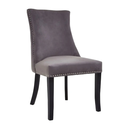 Knightley&nbsp;grey velvet dining chair with button tuft backrest and stud detail, black natural wood legs.  Knightley grey velvet stud deep button tuft backrest with stud detail and black wood legs this dining chair adds a statement piece to any living space in your home.  Dimensions; H98 x L66 x W56