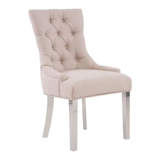 Featuring sophisticated elegance, the natural Raife dining chair will make a statement in a modern, but classically styled, dining room.

Minimal yet stylish, this dining chair has sledge legs at the back and straight legs at the front. The button-backed natural coloured upholstery is tufted in a diamond pattern, giving a classic flair to the aesthetic.

Dimensions; H76 x L58 x W64

Minimum order of 2