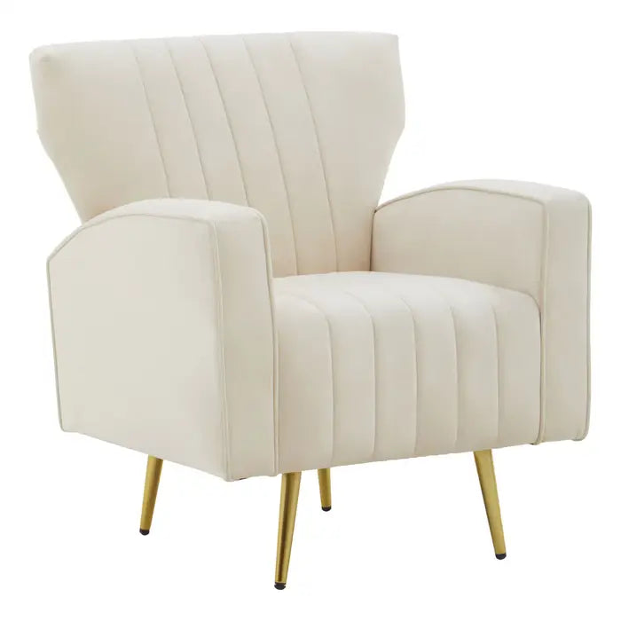 The Halo armchair is a harmony of relaxation and style with plush natural velvet upholstery and gold finish metal legs.  This armchair has a modern retro style with a winged back and natural velvet upholstery. The vertical channel tufting on the seat lends a decorative detail to it. The slanted legs enhance the visual appeal of the armchair.  Dimensions; H68 x L78 x W73