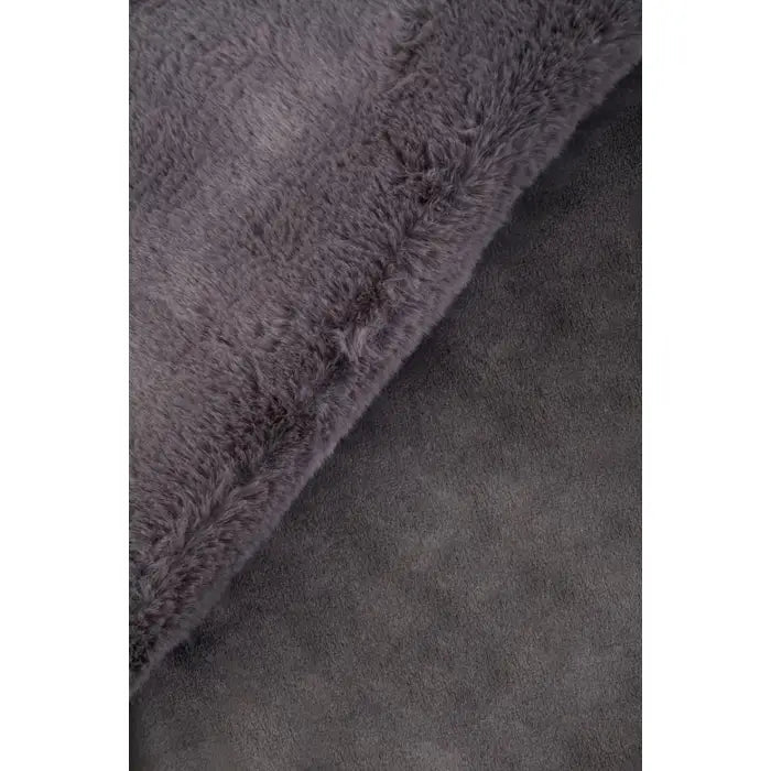 Luxurious Belsey Luna faux fur throw in grey.