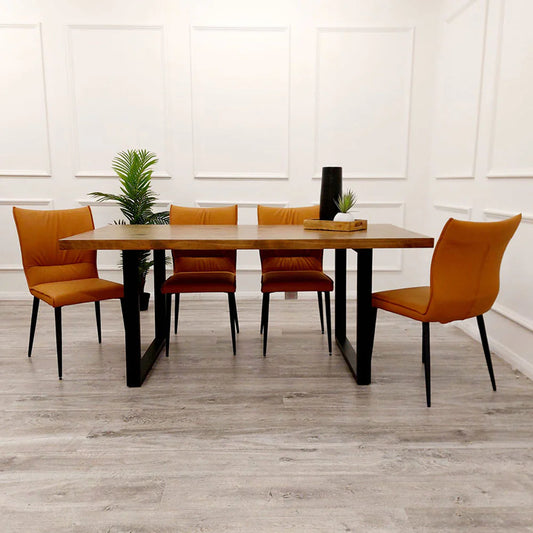 Quality solid Pine&nbsp;wood with Matt Black Metal Square Legs. Paired with Tan Chairs.