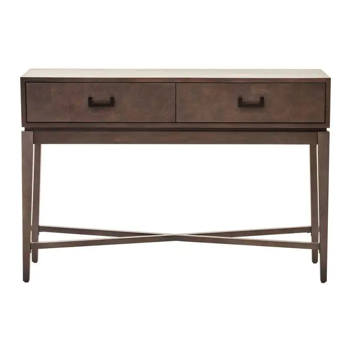 Antique look of the Damari console. The console table has a flat top and two drawers with black metal handle, supported by wooden legs.
