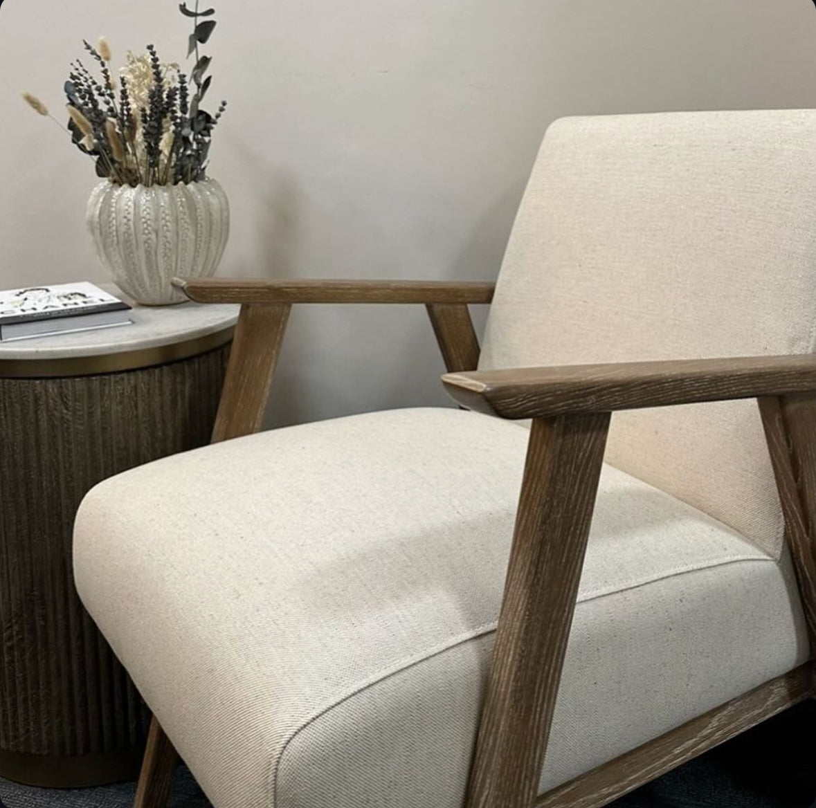 Linen armchair with wood frame.