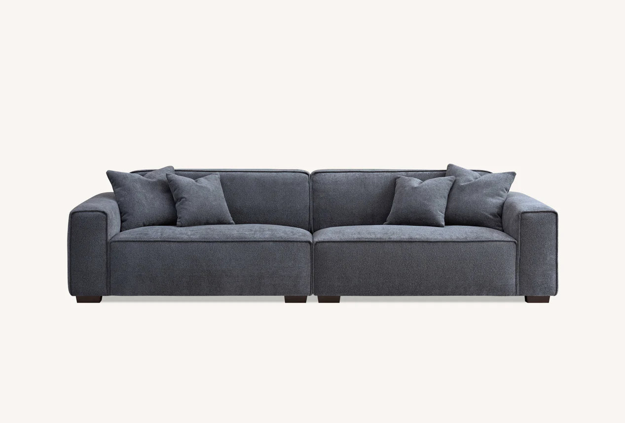 2 seater grey soft touch sofa on plain white background with 4 cushions. 
