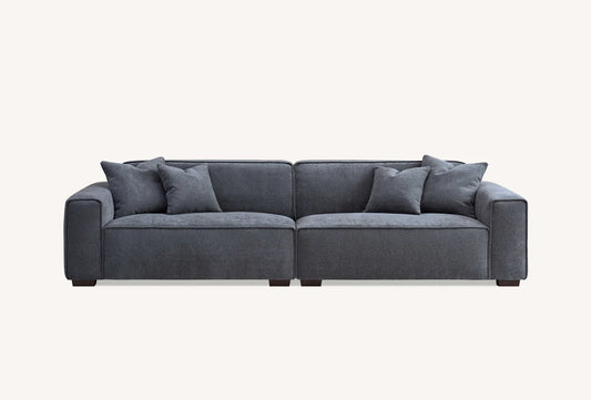 2 seater grey soft touch sofa on plain white background with 4 cushions. 