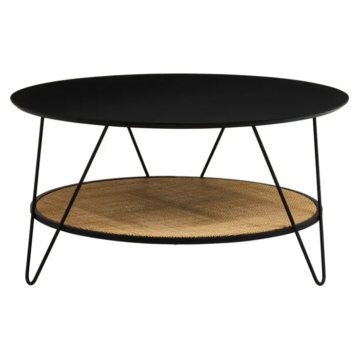 Coffee table with natural rattan shelf with black metal top and matching black metal legs.