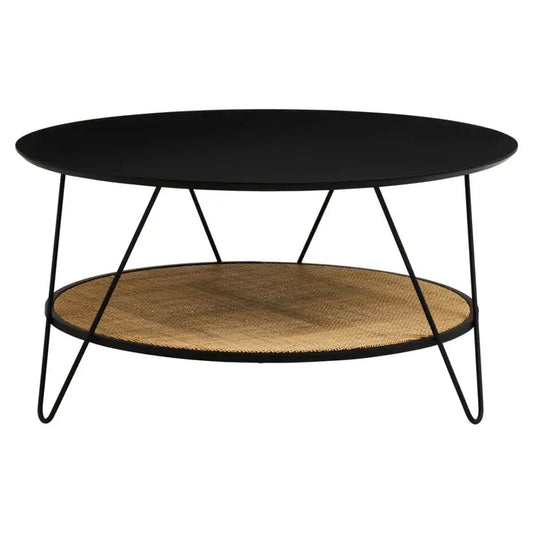 Coffee table with natural rattan shelf with black metal top and matching black metal legs.