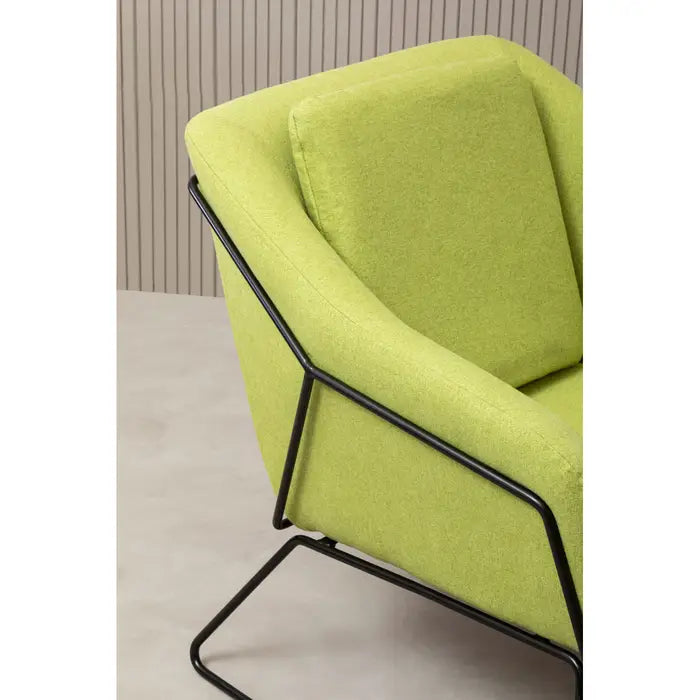 Green comfort chair with black iron frame.
