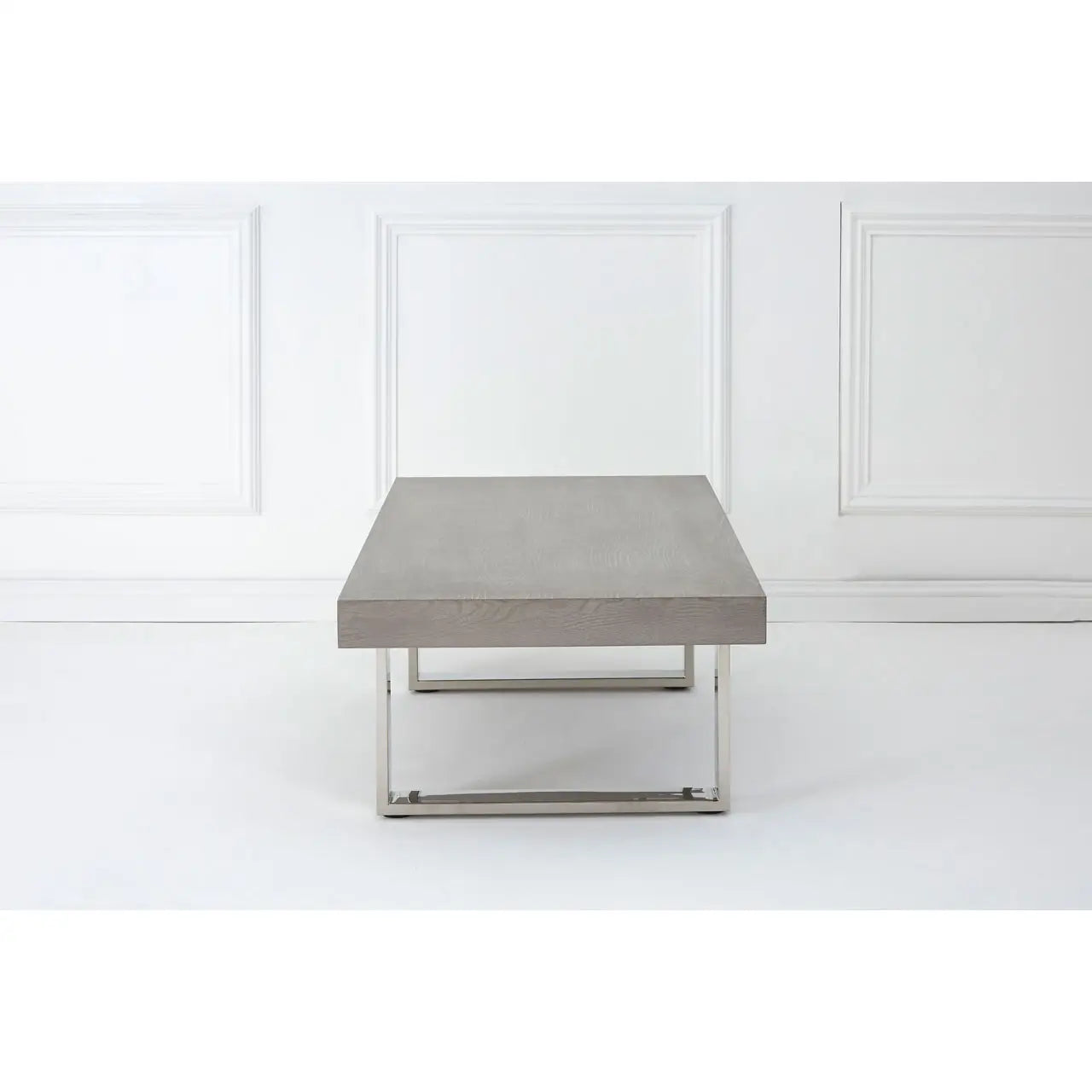 Natural elm wood and reflective steel legs coffee table. 