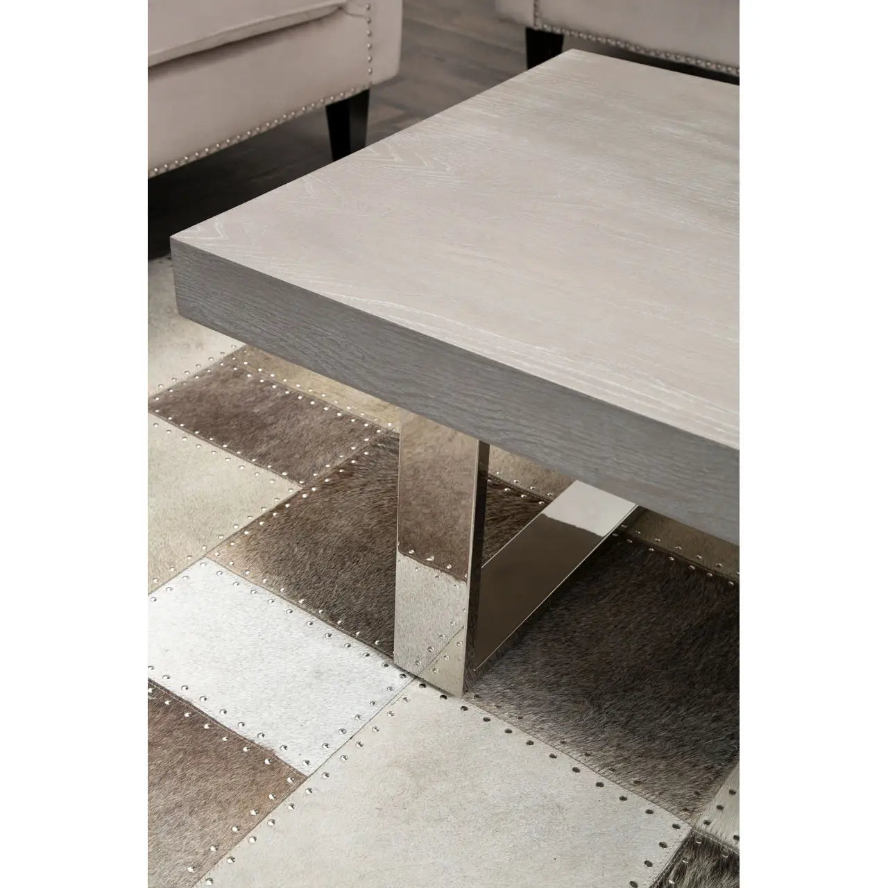 Natural elm wood and reflective steel legs coffee table. 