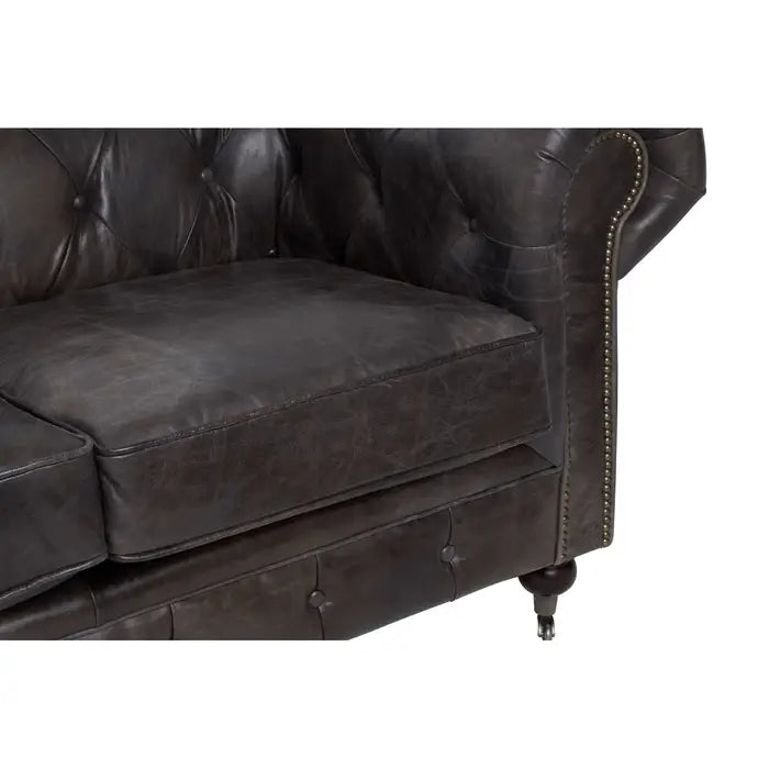 Chesterfield style 2 seater, grey leather sofa with studded detail. 